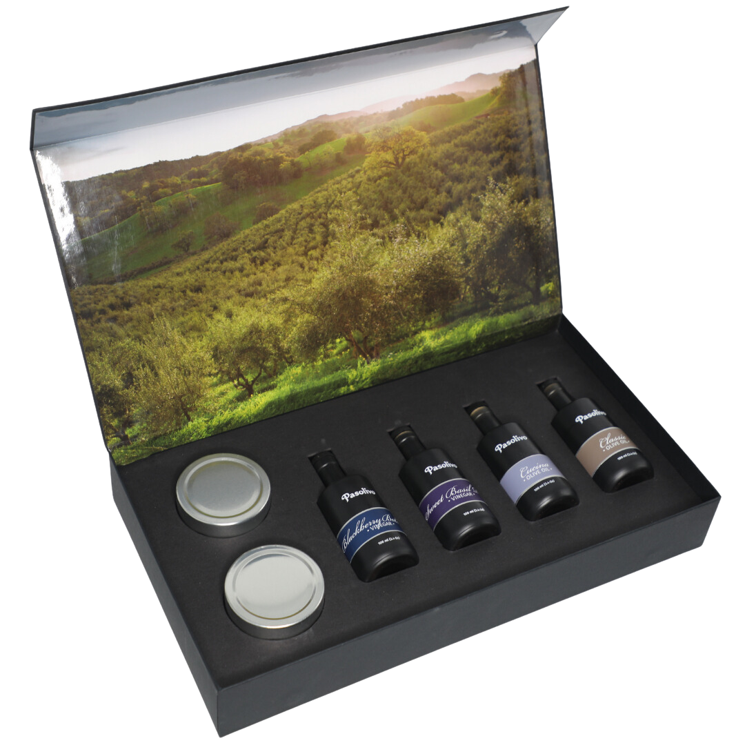 Premium Pasolivo products packaged in beautiful black box with green olive orchard imagery.