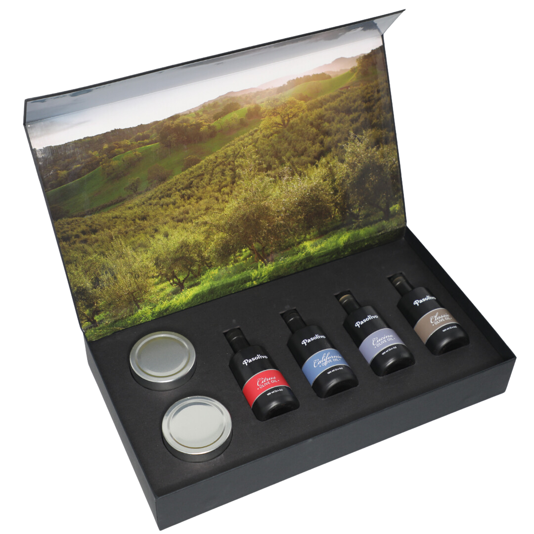 Premium Pasolivo products packaged in beautiful black box with green olive orchard imagery.