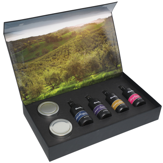 Premium Pasolivo products packaged in beautiful black box with green olive orchard imagery.