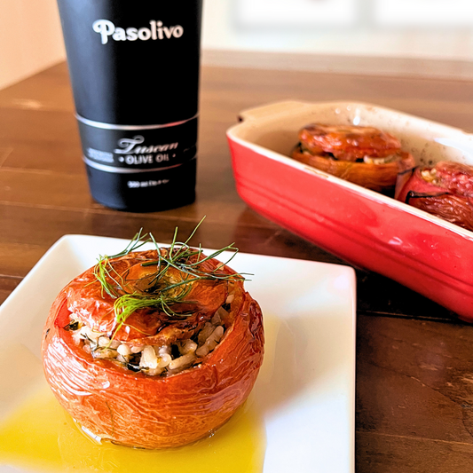 Pasolivo Greek Stuffed Tomatoes Recipe on tabletop next to Pasolivo Tuscan Olive Oil